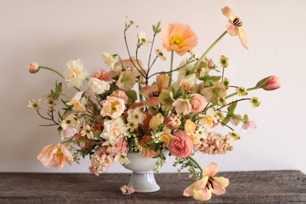 Floral design featuring icelandic poppies designed by Love 'n Fresh Flowers